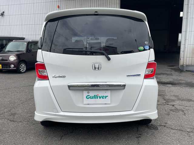 ホンダ フリード スパイク ハイブリット 神奈川県 2015(平27)年 10万km ホワイトオーキッドパール ワンオーナー/純正ナビ/ワンセグテレビ/BT/バックカメラ/クルーズコントロール/ステアリングスイッチ/ETC/電動格納ミラー/フロアマット