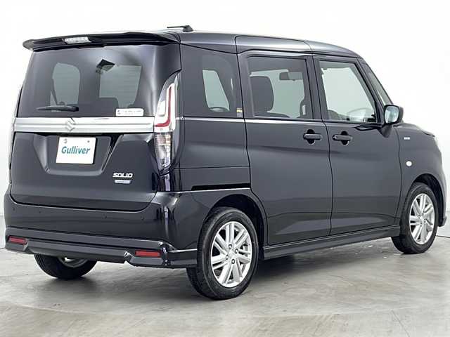 スズキ ソリオ HV MX 道央・札幌 2024(令6)年 1.1万km スーパーブラックパール ・4WD/・社外ナビ&BT&USB/・左側パワースライドドア/・バックカメラ/・スズキセーフティサポート/・アダプティブクルーズコントロール/・コーナーセンサー/・前席シートヒーター/・ドアミラーヒーター/・社外フロアマット/・プッシュスタート/・LEDヘッドライト/・オートライト/・オートマチックハイビーム/・スマートキー