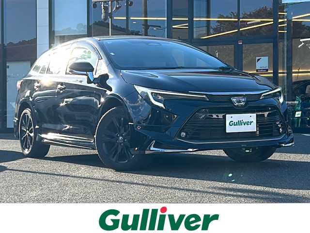 トヨタ カローラツーリング ハイブリッド ダブルバイビー 大阪府 2024(令6)年 1.9万km アティチュードブラックマイカ １オーナー　１０．５型ディスプレイオーディオ　フルセグ　Ｂｌｕｅｔｏｏｔｈ　バックカメラ　プリクラッシュセーフティー　モデリスタ　ハーフレザー　シートヒーター　ステアリングヒーター　レーダークルコン　ＢＳＭ　ＥＴＣ２．０　ウィンカーミラー　プッシュスタート　オートホールド　LEDヘッドライト　スペアキー1　モデリスタドアハンドルプロテクター　モデリスタスカッフプレート　純正ホイール　純正オーディオ　オールシーズンタイヤ