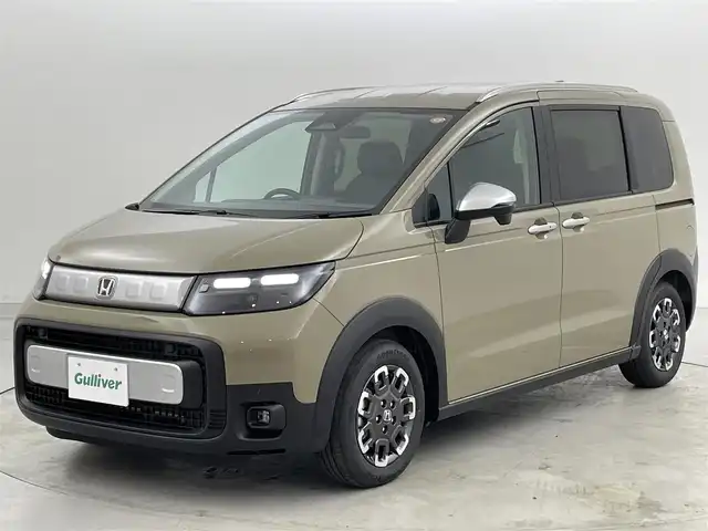 ホンダ フリード クロスター 福岡県 2025(令7)年 0.1万km未満 ベージュⅡ 登録済未使用車　/純正ＤＡナビ（フルセグＴＶ）　/バックカメラ　/ＡＣＣ　/コーナーセンサー　/衝突軽減　/レーンキープ　/ＢＳＭ　/アクセル踏み間違い防止　/両側電動スライドドア　/シートヒーター　/純正１５インチＡＷ