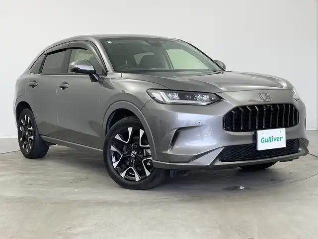 ホンダ ＺＲ－Ｖ ハイブリッド e:HEV Z 新潟県 2023(令5)年 3.3万km スーパープラチナグレーメタリック ホンダセンシング/ブラインドスポットインフォメーション/後退出庫サポート/アダプティブドライビングビーム/マルチビューカメラシステム/本革シート/前席パワーシート/前席シートヒーター/BOSEサウンド/ハンズフリーアクセスパワーテールゲート/純正メーカーOPナビ/ビルトインETC2.0/ステアリングスイッチ/ステアリングヒーター/パドルシフト/フルセグTV/置くだけ充電/前後ミラー型ドライブレコーダー/オートライト/LEDヘッドライト/フロアマット