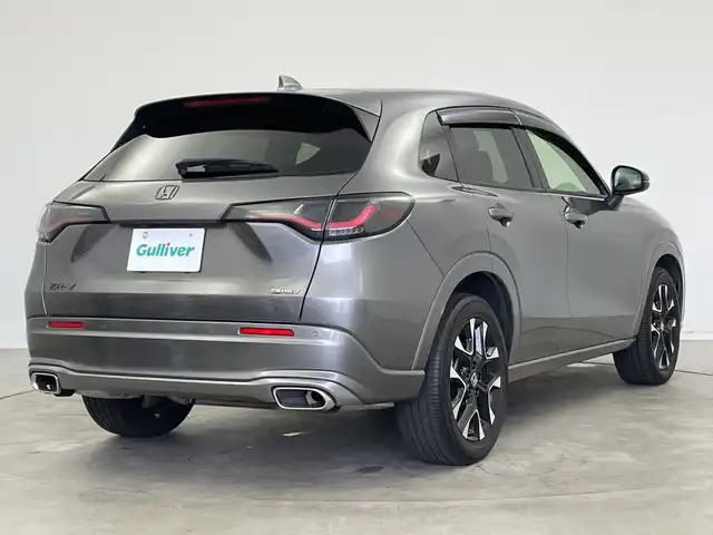 ホンダ ＺＲ－Ｖ ハイブリッド e:HEV Z 新潟県 2023(令5)年 3.3万km スーパープラチナグレーメタリック ホンダセンシング/ブラインドスポットインフォメーション/後退出庫サポート/アダプティブドライビングビーム/マルチビューカメラシステム/本革シート/前席パワーシート/前席シートヒーター/BOSEサウンド/ハンズフリーアクセスパワーテールゲート/純正メーカーOPナビ/ビルトインETC2.0/ステアリングスイッチ/ステアリングヒーター/パドルシフト/フルセグTV/置くだけ充電/前後ミラー型ドライブレコーダー/オートライト/LEDヘッドライト/フロアマット
