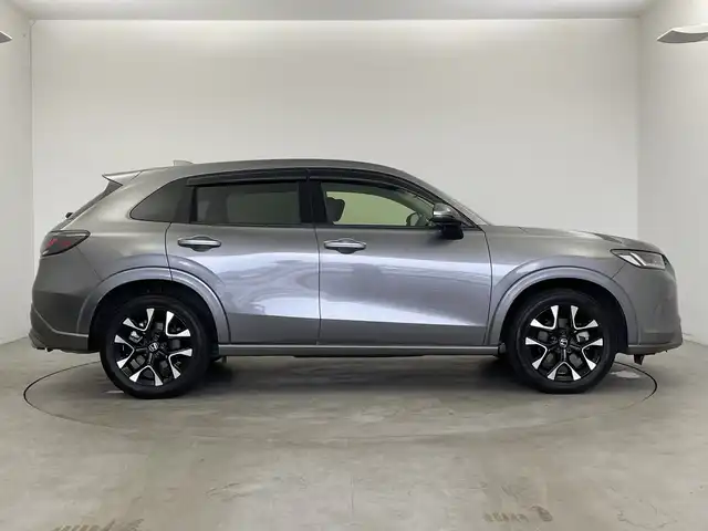 ホンダ ＺＲ－Ｖ ハイブリッド e:HEV Z 新潟県 2023(令5)年 3.3万km スーパープラチナグレーメタリック ホンダセンシング/ブラインドスポットインフォメーション/後退出庫サポート/アダプティブドライビングビーム/マルチビューカメラシステム/本革シート/前席パワーシート/前席シートヒーター/BOSEサウンド/ハンズフリーアクセスパワーテールゲート/純正メーカーOPナビ/ビルトインETC2.0/ステアリングスイッチ/ステアリングヒーター/パドルシフト/フルセグTV/置くだけ充電/前後ミラー型ドライブレコーダー/オートライト/LEDヘッドライト/フロアマット