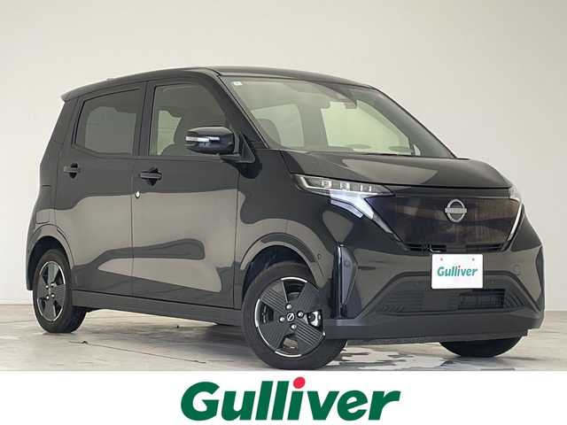 日産 サクラ G 愛知県 2023(令5)年 1.1万km ブラック プロパイロット/純正９型ディスプレイオーディオ（ナビあり）/全方位カメラ/レーダークルーズコントロール/シートヒーター/バックカメラ/コーナーセンサー/純正アルミホイール/ＥＴＣ２．０/LEDヘッドライト/ステアリングヒーター/衝突軽減システム/フルセグ/Bluetooth/ドライブレコーダー/ステアリングスイッチ/スマートキー/プッシュスタート