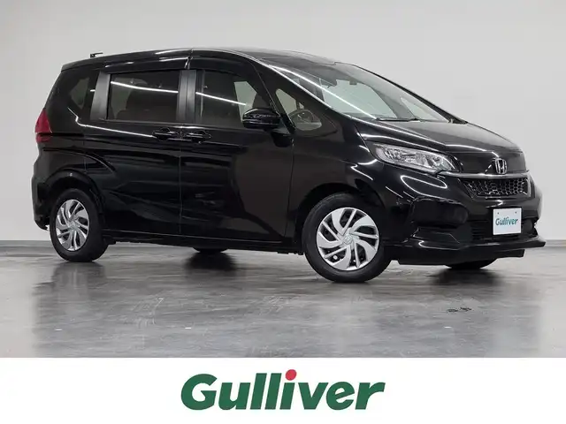 ホンダ フリード G ホンダセンシング 三重県 2020(令2)年 4.8万km クリスタルブラックパール ガソリン/FF/インパネCVT/純正 9インチナビ VXM-217VFNi/（CD/DVD/FM/AM/TV/SD/MusicRack/USB/iPod/Bluetooth/CarPlay）/バックカメラ/両側パワースライドドア/ドライブレコーダー 前後/ビルトイン ETC/Honda SENSING/・衝突軽減ブレーキ［CMBS］/・車線維持支援システム［LKAS］/・アダプティブクルーズコントロール［ACC］/・路外逸脱抑制機能/・標識認識機能/・先行車発進お知らせ機能/・VSA（ABS＋TRC、横すべり抑制）/など/装備/・シートヒーター（D/N）/・オートエアコン/・オートライト/・ステアリングスイッチ/・インフォメーションディスプレイ/・ECONスイッチ/・電動格納ドアミラー/・プッシュスタート/・スマートキーx2/・純正ホイールキャップ＋15インチスチールホイール/・保/取/など