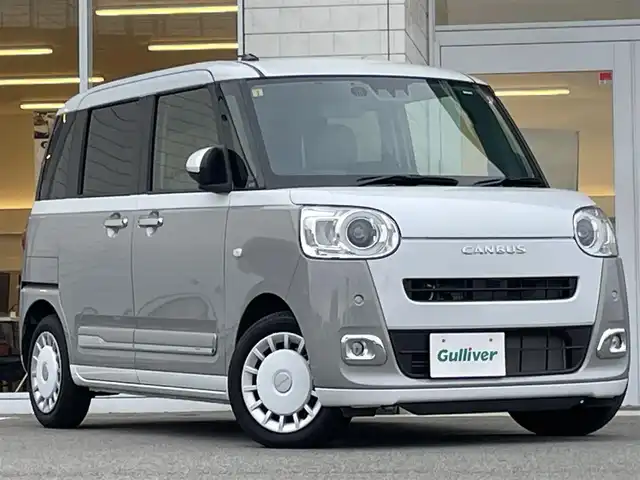 ダイハツ ムーヴ キャンバス ストライプス G ターボ 兵庫県 2023(令5)年 1.3万km シャイニングホワイトパール/スムーズグレーマイカメタリック 純正ディスプレイオーディオ/Bluetooth接続/両側パワースライドドア/フルセグTV/バックカメラ/AppleCarPlay/アンドロイドオート/ワイヤレス充電/保温カップホルダー/シートヒーター/追従有クルーズコントロール/ステアリングリモコン/HDMI/USB/ETC/純正フロアマット/LEDヘッドライト