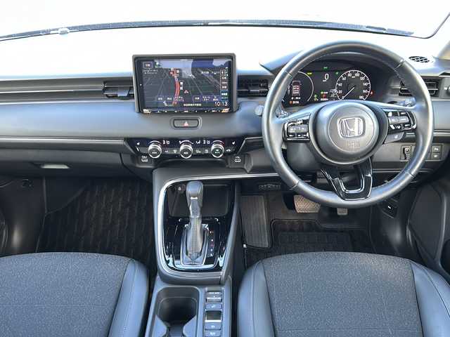 ホンダ ヴェゼル ハイブリッド e:HEV Z 秋田県 2023(令5)年 3.1万km グレー 社外メモリナビ/社外BT、CD、DVD、TV/純正18インチAW/バックカメラ/前後コーナーセンサー/パワーバックドア/ETC/スペアキー/保証書、取説