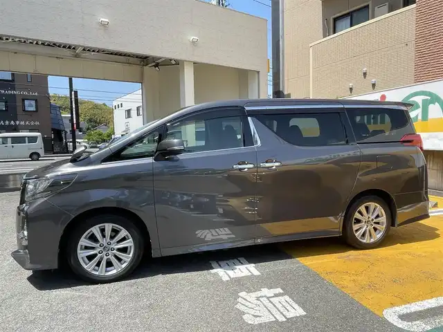 トヨタ アルファード S Aパッケージ 静岡県 2015(平27)年 13.9万km グレーメタリック 純正9インチナビ/フルセグTV/DVD/CD/BT/SD/MSV/バックカメラ/両側パワースライドドア/バックドアイージークローザー/衝突軽減ブレーキ/レーダークルーズコントロール/クリアランスソナー/スペアタイヤ/ビルトインETC/前後ドライブレコーダー/ステアリングスイッチ/LEDヘッドライト/純正18インチAW/スマートキー×2/保証書/取扱説明書/ナビ取扱説明書/R2/4/5/6/7点検記録簿有