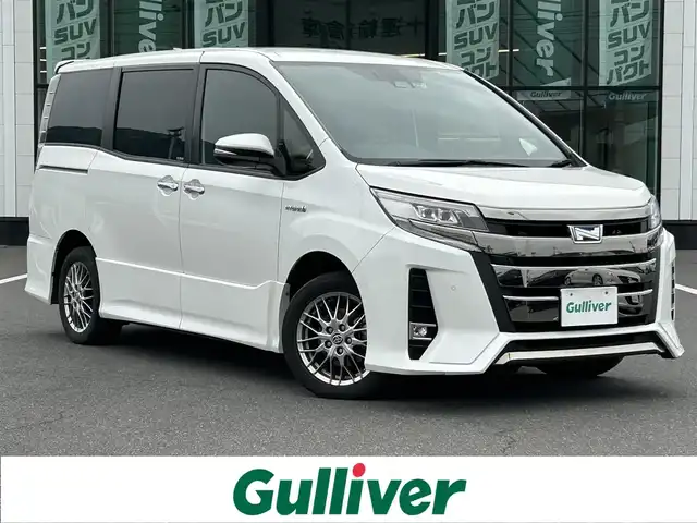 トヨタ ノア ハイブリッド Si ダブルバイビーⅡ 岡山県 2019(平31)年 5.4万km ホワイトパールクリスタルシャイン 純正ナビ　/フルセグTV/バックカメラ　/後席モニター　/ドライブレコーダー　/両側パワースライドドア　/クルーズコントロール　/衝突軽減　/レーンアシスト　/盗難防止装置　/横滑り防止装置　/ETC　/Bluetooth　/純正AW