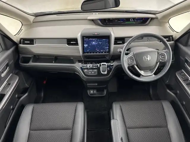 ホンダ フリード ハイブリット G ホンダセンシング 愛知県 2021(令3)年 1.9万km シーグラスブルーパール 禁煙車/純正９インチナビ/（CD/DVD/フルセグTV/Bluetooth/USB)/バックカメラ/ホンダセンシング/・衝突軽減ブレーキ/・レーンキープアシスト/・追従式クルーズコントロール/・クリアランスソナー/・オートマチックハイビーム/前後ドライブレコーダー/ETC/シートヒーター/両側パワースライドドア/スマートキー/スペアキー有/純正15インチアルミホイール/純正フロアマット/横滑り防止装置/アイドリングストップ