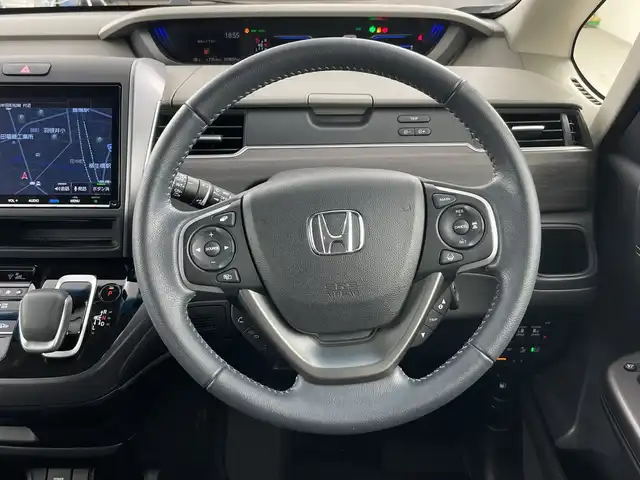 ホンダ フリード ハイブリット G ホンダセンシング 愛知県 2021(令3)年 1.9万km シーグラスブルーパール 禁煙車/純正９インチナビ/（CD/DVD/フルセグTV/Bluetooth/USB)/バックカメラ/ホンダセンシング/・衝突軽減ブレーキ/・レーンキープアシスト/・追従式クルーズコントロール/・クリアランスソナー/・オートマチックハイビーム/前後ドライブレコーダー/ETC/シートヒーター/両側パワースライドドア/スマートキー/スペアキー有/純正15インチアルミホイール/純正フロアマット/横滑り防止装置/アイドリングストップ