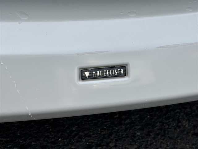 トヨタ ノア X スマートエディション 愛知県 2013(平25)年 7.1万km ホワイトパールクリスタルシャイン /禁煙//モデリスタエアロ（フロント・サイド・リアアンダー）//純正フリップダウンモニター//純正ナビ//CD/DVD/BT/MSV/ブルーレイ/フルセグ/TVキャンセラー//バックカメラ//ビルトインETC//両側パワースライドドア//社外17AW//HIDオートライト//MTモード付AT//横滑り防止装置//電動格納ミラー//三列シート//ウォークスルー//プッシュスタート//純正フロアマット//純正ドアバイザー//スペアスマートキー//新車時保証書//取扱説明書