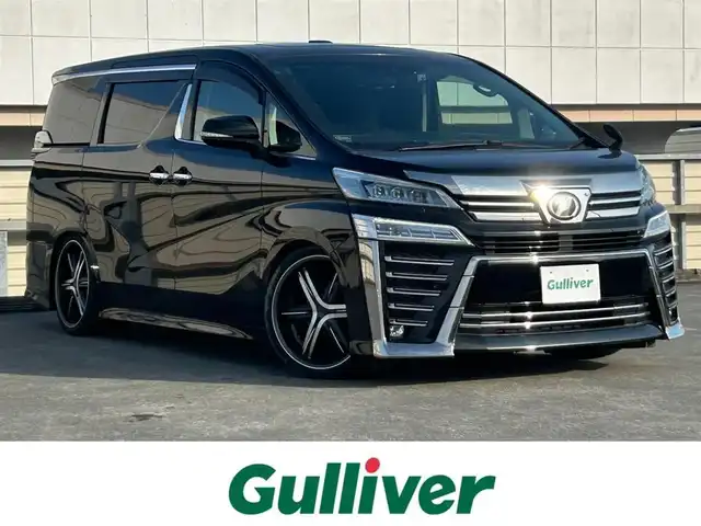 トヨタ ヴェルファイア Z Gエディション 静岡県 2018(平30)年 7.5万km ブラック サンルーフ/トヨタセーフティーセンス/社外11インチナビ/FM/AM/CD/DVD/Bluetooth/SD/両側パワースライドドア/クルーズコントロール/バックカメラ/ドラレコ/LEDヘッドライト/オートハイビーム/オートライト/ステアリングヒーター/メモリーシート/オットマン/シートヒーター/エアシート/Wオートエアコン/デュアルエアコン/純正アルミタイヤ車載