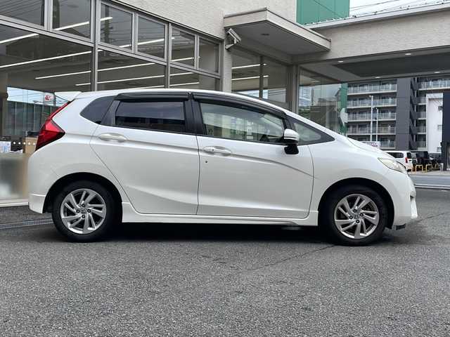 ホンダ フィット 13G Sパッケージ 高知県 2014(平26)年 13.7万km プレミアムホワイトパール 社外ナビ/バックモニター/オートライト