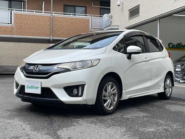 ホンダ フィット 13G Sパッケージ 高知県 2014(平26)年 13.7万km プレミアムホワイトパール 社外ナビ/バックモニター/オートライト