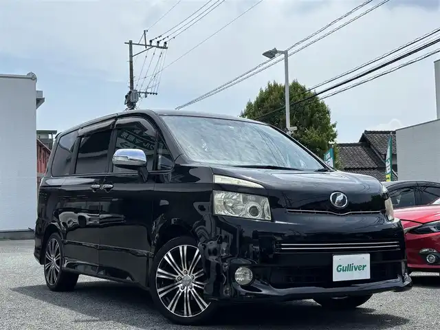 トヨタ ヴォクシー ZS 煌Ⅱ 熊本県 2009(平21)年 15.5万km ブラック 社外ナビ（CN-S300D）/【フルセグTV/Bluetooth/CD/DVD】/フリップダウンモニター/両側パワースライドドア/社外18インチAW/ETC/パドルシフト/革巻きステアリング/ダブルエアバック/オートライト/プッシュスタート/スマートキー/ステアリングスイッチ/ABS/盗難防止装置
