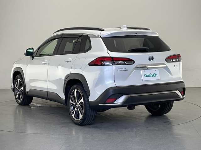 トヨタ カローラ クロス ハイブリッド Z 長野県 2023(令5)年 1.7万km プラチナホワイトパールマイカ 4WD/純正ディスプレイオーディオナビ機能付き/（フルセグ/Bluetooth/AM/FM/USB）/全方位モニター/ビルトインETC2.0/前後ドラレコ/前席シートヒーター/D席パワーシート/衝突軽減ブレーキ/レーンキープアシスト/レーダークルーズコントロール/前後コーナーセンサー/ブラインドスポットモニター/ステアリングヒーター/パワーバックドア/革巻きステアリング/ステアリングスイッチ/ドアバイザー/電子パーキングブレーキ/シーケンシャルウィンカー/LEDヘッドライト/LEDフォグ/スマートキー