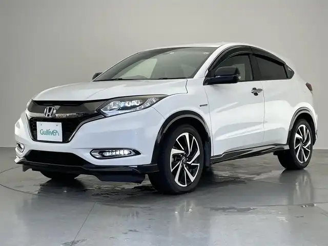 ホンダ ヴェゼル ハイブリッド RS ホンダセンシング 愛知県 2016(平28)年 8万km ホワイトオーキッドパール 純正ナビ　フルセグＴＶ　ＢＴ　ＨＤＭＩ　バックカメラ　ハーフレザー　シートヒーター　ドラレコ　ＥＴＣ　ホンダセンシング　衝突軽減　追従クルコン　ハンドル支援　ＬＥＤオートライト　フォグランプ　禁煙車