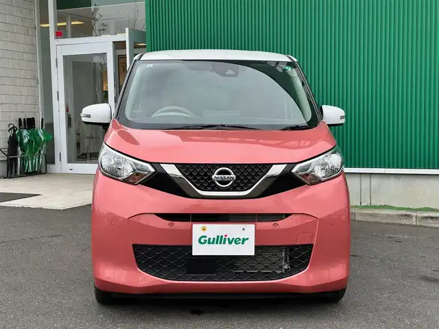 日産 デイズ ボレロ 宮城県 2021(令3)年 0.8万km ピンクⅡ 2トーン仕様/・ホワイトパールルーフ/・ルーフ同色ドアミラー/・ルーフ同色サイドドアハンドル/インテリジェントアラウンドビューモニター＋ウィンカーミラー/＝＝＝/インテリジェントエマージェンシーブレーキ/車線逸脱警報/車線逸脱防止支援システム/踏み間違い防止アシスト/前方衝突予測警報/ふらつき警報/標識検知警報/先行車発進お知らせ機能/コーナーセンサー/ハイビームアシスト/純正9インチナビ（MM320D-L）/・CD/DVD/・Bluetooth/・フルセグTV/ETC/ドライブレコーダー/ハーフレザーシート/革巻きステアリング/ステアリングスイッチ/インテリジェントオートライト/電動格納ミラー/純正14インチAW/純正ドアバイザー/純正フロアマット/W/サイド/カーテン/ニーエアバッグ