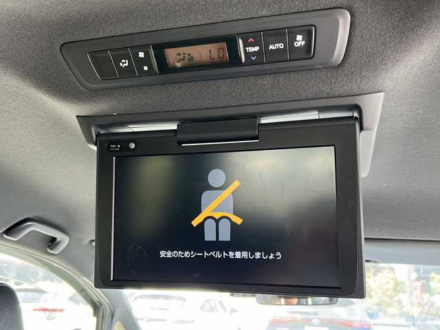 トヨタ ヴォクシー ZS 煌Ⅲ 鹿児島県 2021(令3)年 5.2万km ブラック トヨタセーフティセンス/-衝突被害軽減ブレーキ/-先行車発信告知機能/フリップダウンモニター/純正SDナビ　NXZT-Y68T/（CDDVD/フルセグテレビ/Bluetooth）/バックカメラ/両側パワースライドドア/クルーズコントロール/LEDヘッドライト・フォグ/オートライト/ハーフレザーシート/三列シート/純正16インチアルミホイール/アイドリングストップ/リアオートエアコン/スマートキー/ビルトインETC
