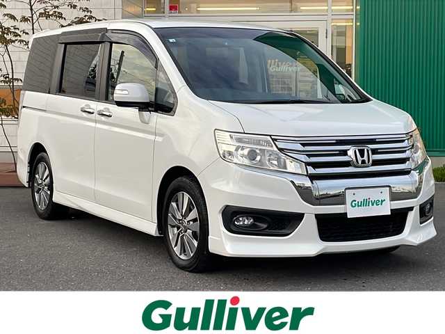 ホンダ ステップワゴン スパーダ Z 青森県 2012(平24)年 9.7万km ホワイトオーキッドパール 4WD/社外ディスプレイオーディオ/CD・DVD・Bluetooth/社外フリップダウンモニター/両側パワースライドドア/パドルシフト/ビルトインETC/スマートキー/HIDヘッドライト/オートライト/フォグランプ/アクティブコーナリングライト/純正16インチアルミ