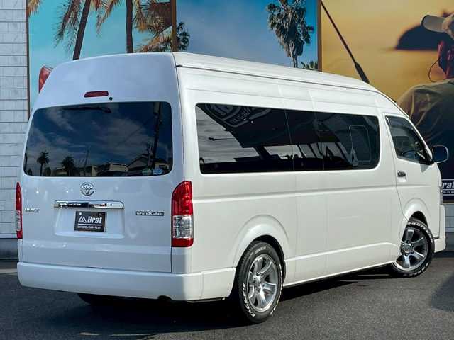 トヨタ ハイエース グランドキャビン 宮崎県 2015(平27)年 2.8万km ホワイトパールクリスタルシャイン アルパインフリップダウンモニター/モデリスタフロントスポイラー/ローダウン　/オーバーフェンダー　/カロッツェリアＳＤナビ（CD・DVD・Bluetooth・フルセグTV）/ＥＴＣ　/前方ドラレコ　/バックカメラ　/ドアバイザー　/フロアマット