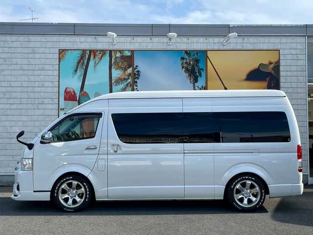 トヨタ ハイエース グランドキャビン 宮崎県 2015(平27)年 2.8万km ホワイトパールクリスタルシャイン アルパインフリップダウンモニター/モデリスタフロントスポイラー/ローダウン　/オーバーフェンダー　/カロッツェリアＳＤナビ（CD・DVD・Bluetooth・フルセグTV）/ＥＴＣ　/前方ドラレコ　/バックカメラ　/ドアバイザー　/フロアマット