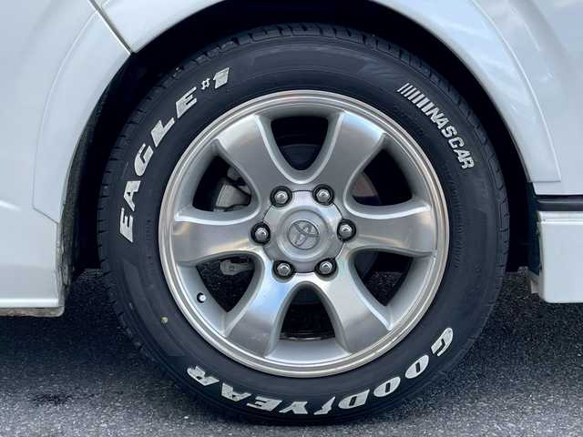 トヨタ ハイエース グランドキャビン 宮崎県 2015(平27)年 2.8万km ホワイトパールクリスタルシャイン アルパインフリップダウンモニター/モデリスタフロントスポイラー/ローダウン　/オーバーフェンダー　/カロッツェリアＳＤナビ（CD・DVD・Bluetooth・フルセグTV）/ＥＴＣ　/前方ドラレコ　/バックカメラ　/ドアバイザー　/フロアマット