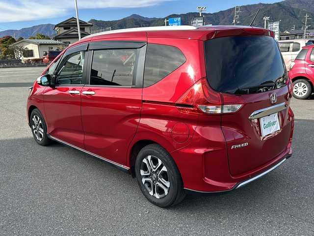 ホンダ フリード クロスター ホンダセンシング 山梨県 2020(令2)年 5.3万km プレミアムクリスタルレッドM 社外ナビ/バックカメラ/BT/USB/CD/フルセグTV/両側パワースライドドア/純正アルミホイール/ETC/３列シート/ウォークスルー/前席シートヒーター/ドライブレコーダー/スマートキー/LEDヘッドライト/アイドリングストップ