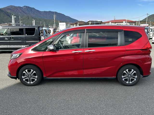 ホンダ フリード クロスター ホンダセンシング 山梨県 2020(令2)年 5.3万km プレミアムクリスタルレッドM 社外ナビ/バックカメラ/BT/USB/CD/フルセグTV/両側パワースライドドア/純正アルミホイール/ETC/３列シート/ウォークスルー/前席シートヒーター/ドライブレコーダー/スマートキー/LEDヘッドライト/アイドリングストップ