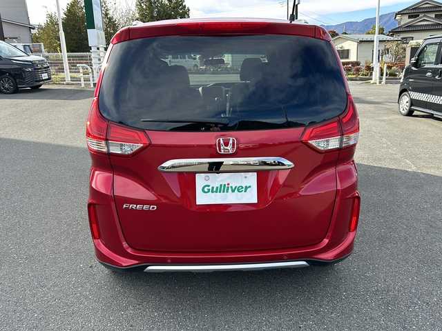 ホンダ フリード クロスター ホンダセンシング 山梨県 2020(令2)年 5.3万km プレミアムクリスタルレッドM 社外ナビ/バックカメラ/BT/USB/CD/フルセグTV/両側パワースライドドア/純正アルミホイール/ETC/３列シート/ウォークスルー/前席シートヒーター/ドライブレコーダー/スマートキー/LEDヘッドライト/アイドリングストップ