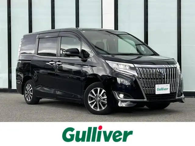 トヨタ エスクァイア ハイブリッド Gi 大阪府 2019(令1)年 4万km スパークリングブラックパールクリスタルシャイン 社外ナビ　carrozzerria/・Bluetooth/フルセグTV/CD/DVD/HDMI/　ラジオ/主要装備/・クルーズコントロール/・パーキングサポートブレーキー/・プリクラッシュセーフティー/・クリアランスソナー/・レーンアシスト/・横滑り防止装置/・先行車発進告知/・トラクションコントロール/・両側パワースライドドア/・合皮シート/・シートヒーター/・LEDヘッドライト/・オートマチックハイビーム/・ドライブレコーダー/・ETC