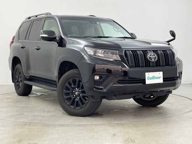 トヨタ ランドクルーザー プラド TX Lパッケージ マットブラED 新潟県 2023(令5)年 2.1万km ブラック プリクラッシュセーフティ/レーダークルーズコントロール/レーンディパーチャーアラート/パーキングサポートブレーキ/ロードサインアシスト/サンルーフ/ベージュ革シート/エアシート/シートヒーター/パワーシート/オートライト/オートハイビーム/LEDヘッドライト/ビルトインETC/純正ナビ/バックカメラ/プッシュスタート/オートドアミラー/ウィンカーミラー/ステアリングスイッチ