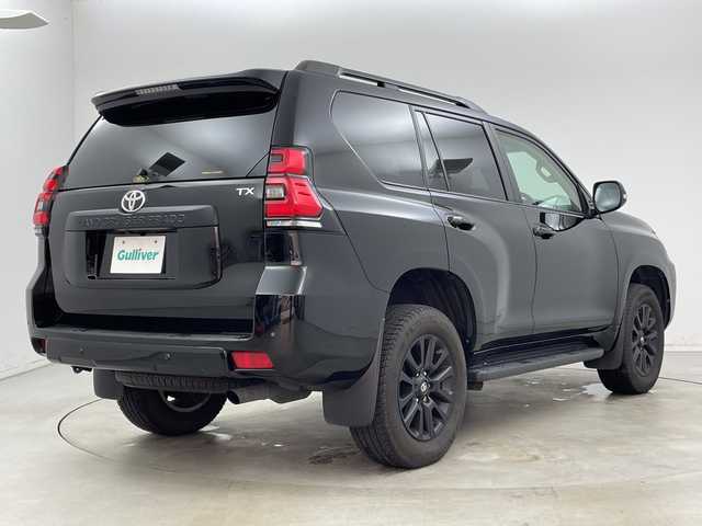 トヨタ ランドクルーザー プラド TX Lパッケージ マットブラED 新潟県 2023(令5)年 2.1万km ブラック プリクラッシュセーフティ/レーダークルーズコントロール/レーンディパーチャーアラート/パーキングサポートブレーキ/ロードサインアシスト/サンルーフ/ベージュ革シート/エアシート/シートヒーター/パワーシート/オートライト/オートハイビーム/LEDヘッドライト/ビルトインETC/純正ナビ/バックカメラ/プッシュスタート/オートドアミラー/ウィンカーミラー/ステアリングスイッチ