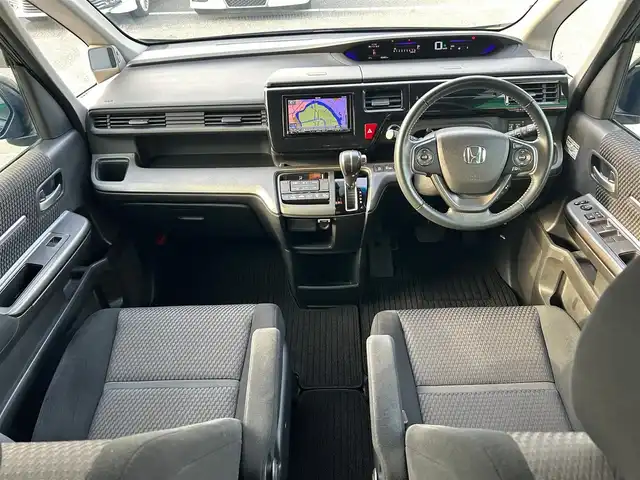 ホンダ ステップワゴン スパーダ 徳島県 2015(平27)年 5.7万km プレミアムスパークルブラックパール ナビ【AVN-Z04i】/レーダークルーズコントロール/両側パワースライドドア/純正１６インチアルミホイール/純正フロアマット/衝突被害軽減システム/レーンキープアシスト/横滑り防止装置/盗難防止装置/バックカメラ/ETC/プッシュスタート/スマートキー
