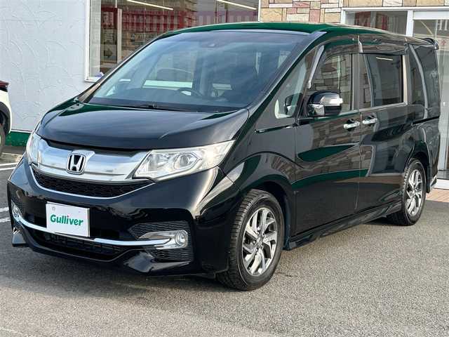 ホンダ ステップワゴン スパーダ 徳島県 2015(平27)年 5.7万km プレミアムスパークルブラックパール ナビ【AVN-Z04i】/レーダークルーズコントロール/両側パワースライドドア/純正１６インチアルミホイール/純正フロアマット/衝突被害軽減システム/レーンキープアシスト/横滑り防止装置/盗難防止装置/バックカメラ/ETC/プッシュスタート/スマートキー