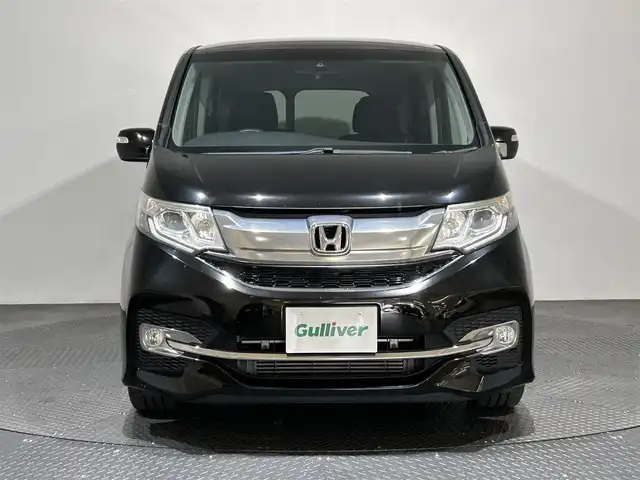 ホンダ ステップワゴン スパーダ 愛媛県 2015(平27)年 5.7万km プレミアムスパークルブラックパール ナビ【AVN-Z04i】/レーダークルーズコントロール/両側パワースライドドア/純正１６インチアルミホイール/純正フロアマット/衝突被害軽減システム/レーンキープアシスト/横滑り防止装置/盗難防止装置/バックカメラ/ETC/プッシュスタート/スマートキー