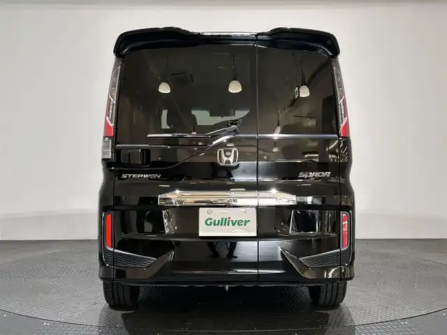 ホンダ ステップワゴン スパーダ 愛媛県 2015(平27)年 5.7万km プレミアムスパークルブラックパール ナビ【AVN-Z04i】/レーダークルーズコントロール/両側パワースライドドア/純正１６インチアルミホイール/純正フロアマット/衝突被害軽減システム/レーンキープアシスト/横滑り防止装置/盗難防止装置/バックカメラ/ETC/プッシュスタート/スマートキー