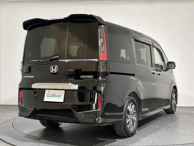 ホンダ ステップワゴン スパーダ 愛媛県 2015(平27)年 5.7万km プレミアムスパークルブラックパール ナビ【AVN-Z04i】/レーダークルーズコントロール/両側パワースライドドア/純正１６インチアルミホイール/純正フロアマット/衝突被害軽減システム/レーンキープアシスト/横滑り防止装置/盗難防止装置/バックカメラ/ETC/プッシュスタート/スマートキー