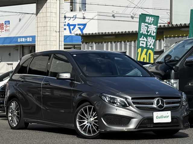 メルセデス・ベンツ Ｂ１８０ スポーツ 愛知県 2015(平27)年 7.4万km マウンテングレー /純正HDDナビ//AM/FM/CD/DVD/BT//フルセグ/SD/USB//レーダーセーフティパッケージ//プリクラッシュセーフティー//ブラインドスポットモニター//レーダークルーズコントロール//レーンキープアシスト//AMGライン//ETC//D・N席メモリ付きパワーシート//シートヒーター//オートLEDヘッドライト//フォグランプ//リヤフォグランプ//オートリトラクタブルウィンカーミラー//オートワイパー//パドルシフト//ステアリングスイッチ//照明付きバニティミラー//スペアキー//取扱説明書//保証書