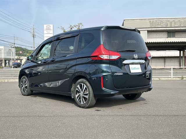 ホンダ フリード ハイブリット EX 岡山県 2019(平31)年 6.2万km フォレストグリーンパール 純正9インチメモリーナビ/CD/DVD/HDMI/Bluetooth/フルセグTV/バックカメラ/両側パワースライドドア/HONDA SENSING/・アダプティブクルーズコントロール/・衝突軽減ブレーキ/・車線維持支援システム/・誤発進抑制機能/・先行車発進お知らせ機能/・オートハイビーム/・標識認識機能/LEDヘッドライト/アクティブコーナリングライト/純正15インチAW/ハーフレザーシート/ETC/ドライブレコーダー/禁煙車