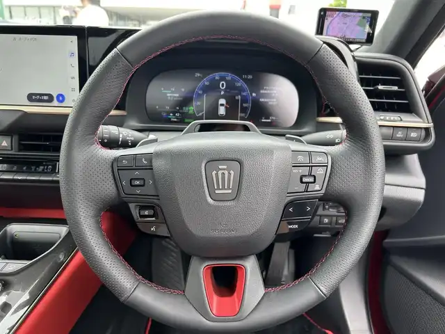 トヨタ クラウン スポーツ RS 兵庫県 2024(令6)年 0.8万km 赤 ワンオーナー/メーカー純正ナビ/（BT/フルセグTV/USB/Miracast）/全方位カメラ/トヨタチームメイト/GPSレーダー/パノラマルーフ/クリアランスソナー/レーダークルーズコントロール/パドルシフト/ETC２．０/AC100V/スマートキー/スペアキー/充電ケーブル/保証書