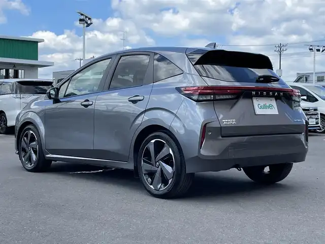 日産 オーラ G レザーエディション 東京都 2023(令5)年 1.6万km ダークメタルグレー プロパイロット/純正９型メモリーナビ＆地デジ/・BOSEパーソナルプラスサウンドシステム/・BluetoothAudio/・AppleCarPlay＆AndroidAuto/・HDMI/アラウンドビューモニター/全方位運転支援システム/・インテリジェントエマージェンシーブレーキ/・標識検知機能/・前方衝突予測警報/・車線逸脱警報/・ふらつき警報/・車線逸脱防止支援システム/・後側方衝突防止支援システム/・後側方車両検知機能/・後退時車両検知機能/インテリジェントルームミラー/エマージェンシーブレーキ/車線逸脱警報/ソナー/シートヒーター/ＥＴＣ/ワイヤレス充電器/ドライブレコーダー