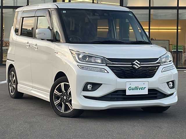 スズキ ソリオ バンディット HV MV 青森県 2020(令2)年 8.2万km ピュアホワイトP ・4WD/・社外SDナビ/・Bluetooth/・フルセグ/・前後ドライブレコーダー/・全方位カメラ/・衝突軽減ブレーキ/・レーンキープアシスト/・レーダークルーズコントロール/・両側パワースライドドア/・コーナーセンサー/・シートヒーター/・プッシュスタート/・スマートキー/・パドルシフト/・オートライト/・オートマチックハイビーム/・スペアキー/・純正LEDヘッドライト/・純正AW
