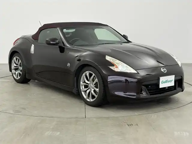 日産 フェアレディ Ｚ ロードスター バージョンT 愛知県 2011(平23)年 7.3万km プレミアムディープマルーン BOSEプレミアムサウンド/純正ナビ/（DVD/CD/FM/AM/AUX/ワンセグTV/Bluetooth）/パワーシート/シートヒーター/シートクーラー/ETC/パドルシフト/純正フロアマット/純正18インチAW/純正LEDライト/オートライト/スマート/プッシュスタート