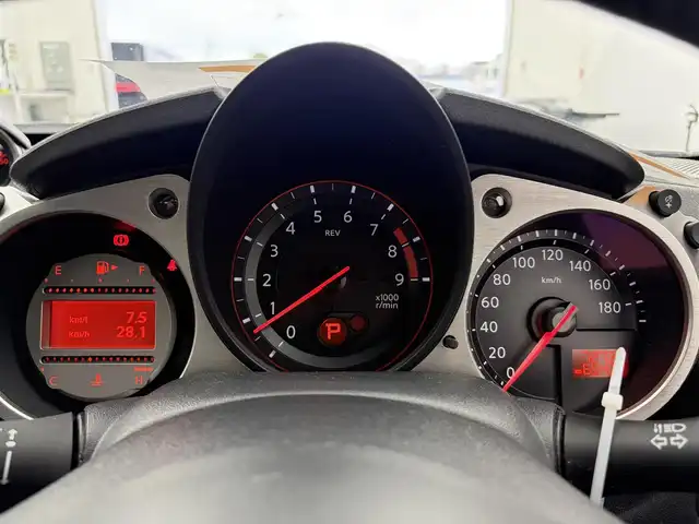 日産 フェアレディ Ｚ ロードスター バージョンT 愛知県 2011(平23)年 7.3万km プレミアムディープマルーン BOSEプレミアムサウンド/純正ナビ/（DVD/CD/FM/AM/AUX/ワンセグTV/Bluetooth）/パワーシート/シートヒーター/シートクーラー/ETC/パドルシフト/純正フロアマット/純正18インチAW/純正LEDライト/オートライト/スマート/プッシュスタート