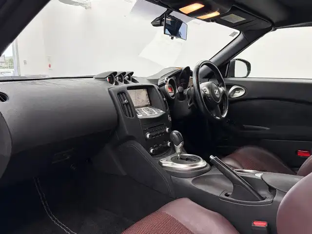 日産 フェアレディ Ｚ ロードスター バージョンT 愛知県 2011(平23)年 7.3万km プレミアムディープマルーン BOSEプレミアムサウンド/純正ナビ/（DVD/CD/FM/AM/AUX/ワンセグTV/Bluetooth）/パワーシート/シートヒーター/シートクーラー/ETC/パドルシフト/純正フロアマット/純正18インチAW/純正LEDライト/オートライト/スマート/プッシュスタート