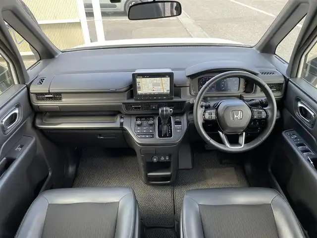 ホンダ ステップワゴン スパーダ 東京都 2024(令6)年 1.2万km プラチナホワイトパール Ｇａｔｈｅｒｓ純正８型ナビ　フルセグＴＶ　ＣＤ／ＤＶＤ　バックカメラ　追従クルーズ　ＢＳＭ　シートヒーター　両側パワースライドドア　電動リアゲート　ＥＴＣ　ドライブレコーダー　衝突被害軽減ブレーキ