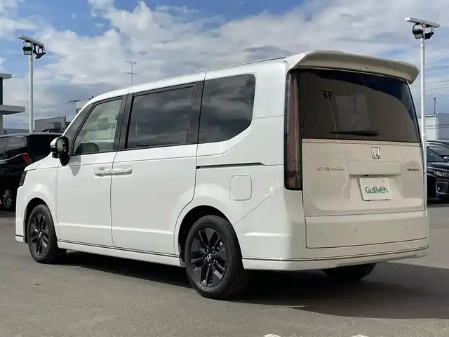 ホンダ ステップワゴン スパーダ 東京都 2024(令6)年 1.2万km プラチナホワイトパール Ｇａｔｈｅｒｓ純正８型ナビ　フルセグＴＶ　ＣＤ／ＤＶＤ　バックカメラ　追従クルーズ　ＢＳＭ　シートヒーター　両側パワースライドドア　電動リアゲート　ＥＴＣ　ドライブレコーダー　衝突被害軽減ブレーキ
