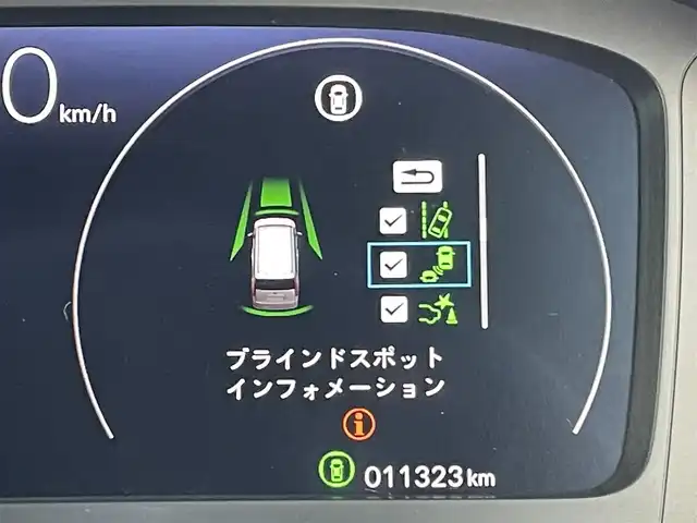 ホンダ ステップワゴン スパーダ 東京都 2024(令6)年 1.2万km プラチナホワイトパール Ｇａｔｈｅｒｓ純正８型ナビ　フルセグＴＶ　ＣＤ／ＤＶＤ　バックカメラ　追従クルーズ　ＢＳＭ　シートヒーター　両側パワースライドドア　電動リアゲート　ＥＴＣ　ドライブレコーダー　衝突被害軽減ブレーキ